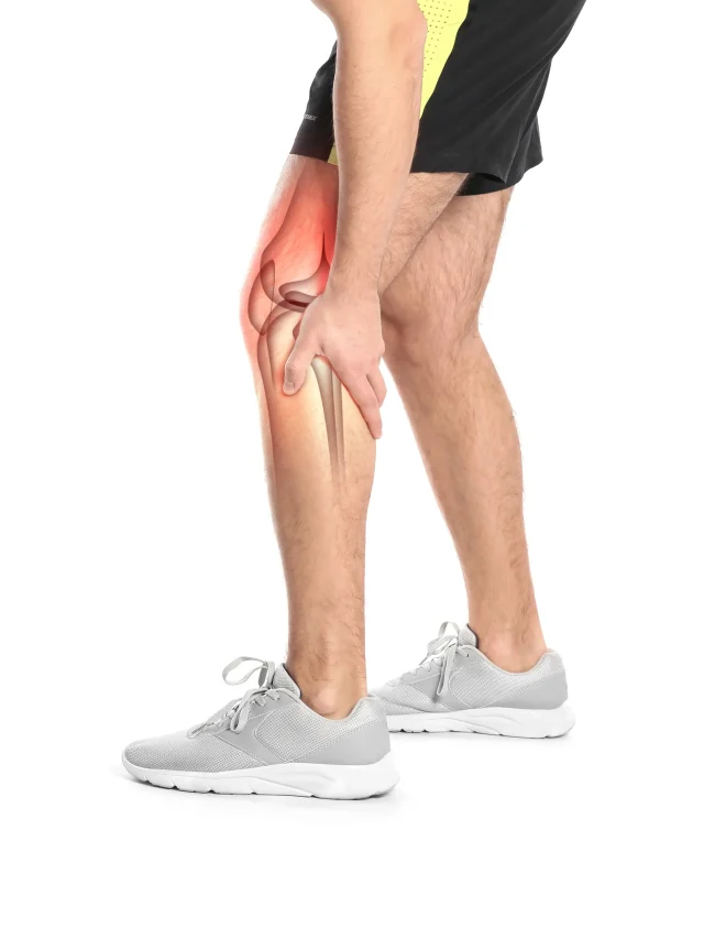 man-suffering-from-knee-pain-white-background-closeup