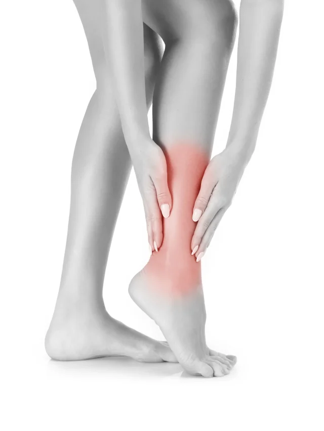 woman-suffering-from-ankle-pain-white-background